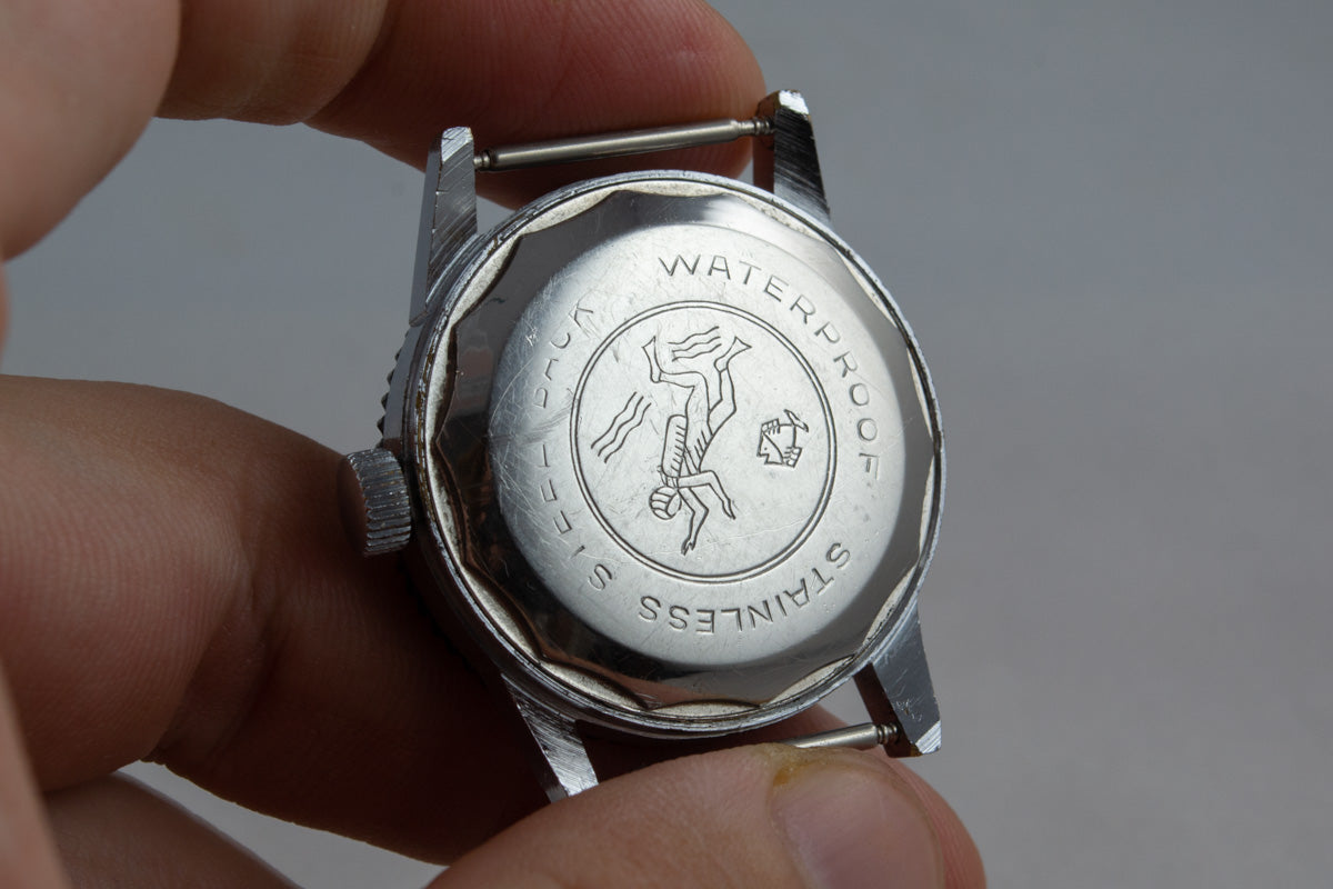 Chanor Besançon Diver mécanique lumeville montre vintage