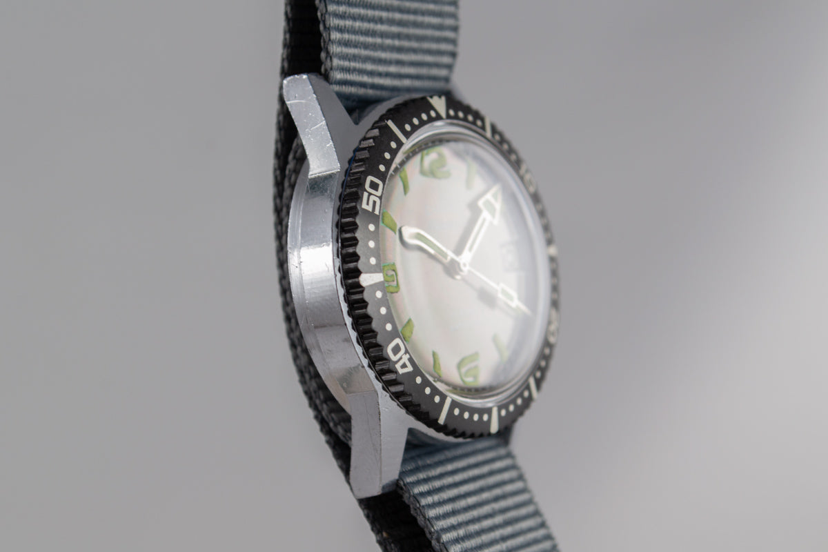 Chanor Besançon Diver mécanique lumeville montre vintage