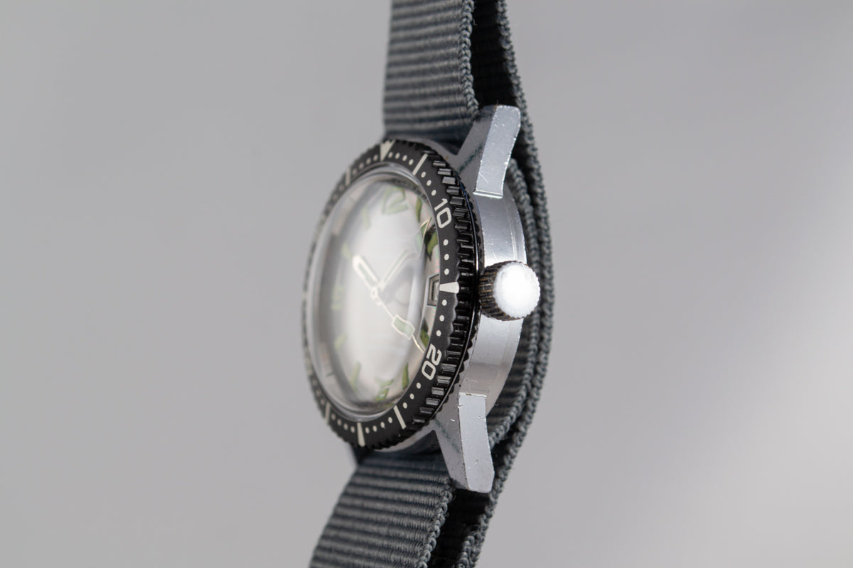 Chanor Besançon Diver mécanique lumeville montre vintage