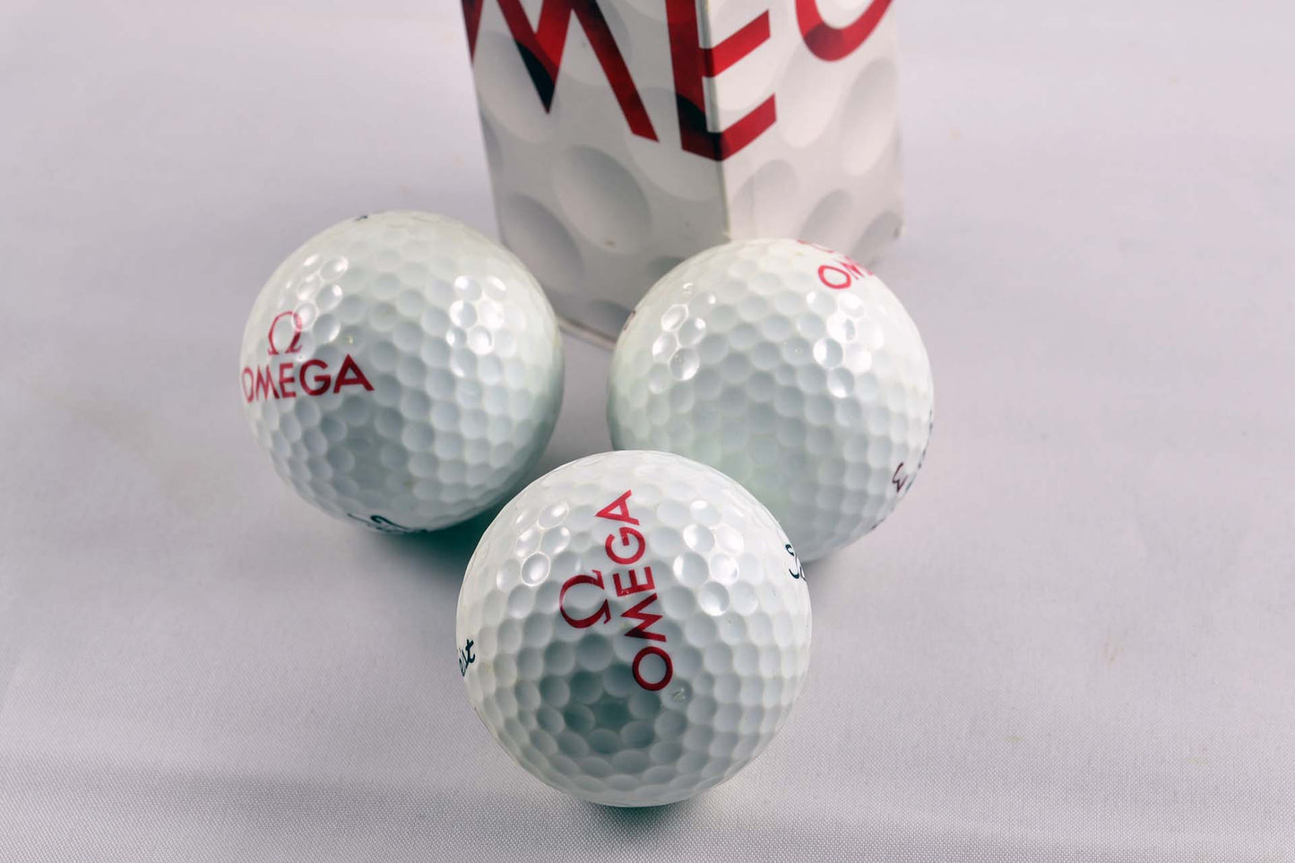 Omega Titleist balles de golf montre horloger lumeville