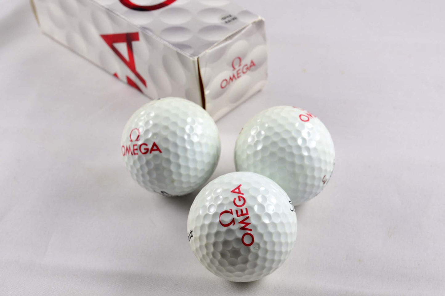 Omega Titleist balles de golf montre horloger lumeville