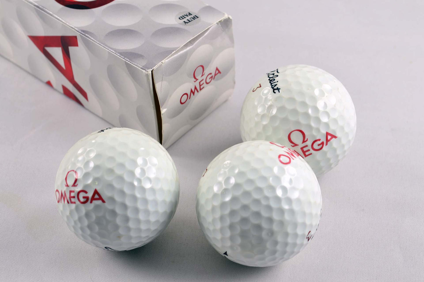 Omega Titleist balles de golf montre horloger lumeville