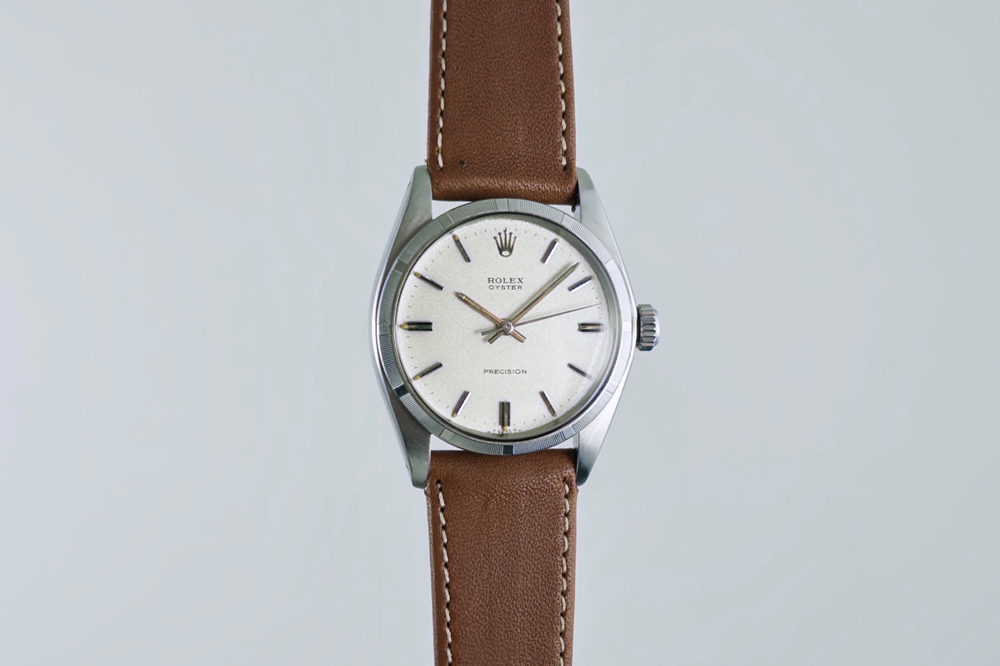 Rolex Oyster Precision 6426 three-quarter view with applied indices on the silver dial