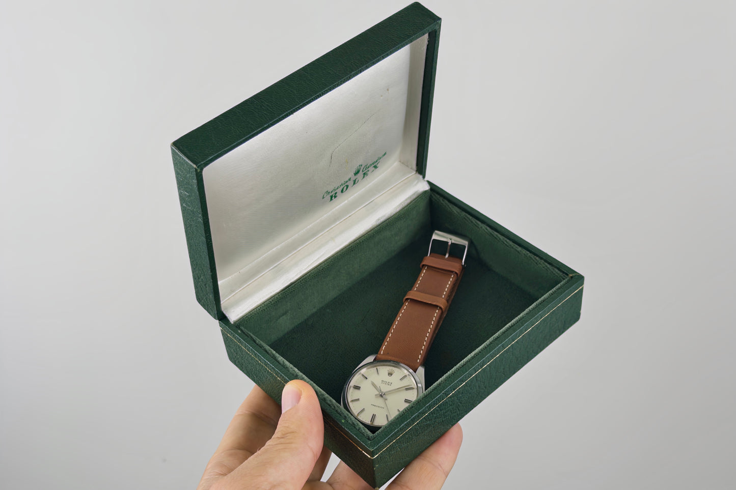 Rolex Oyster Precision 6426 inside its open green Rolex presentation box