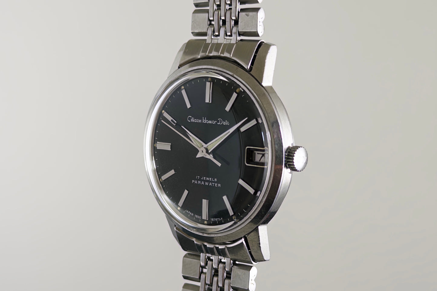 Citizen Homer Date 63-2058 at an angle showing the crown and polished steel case