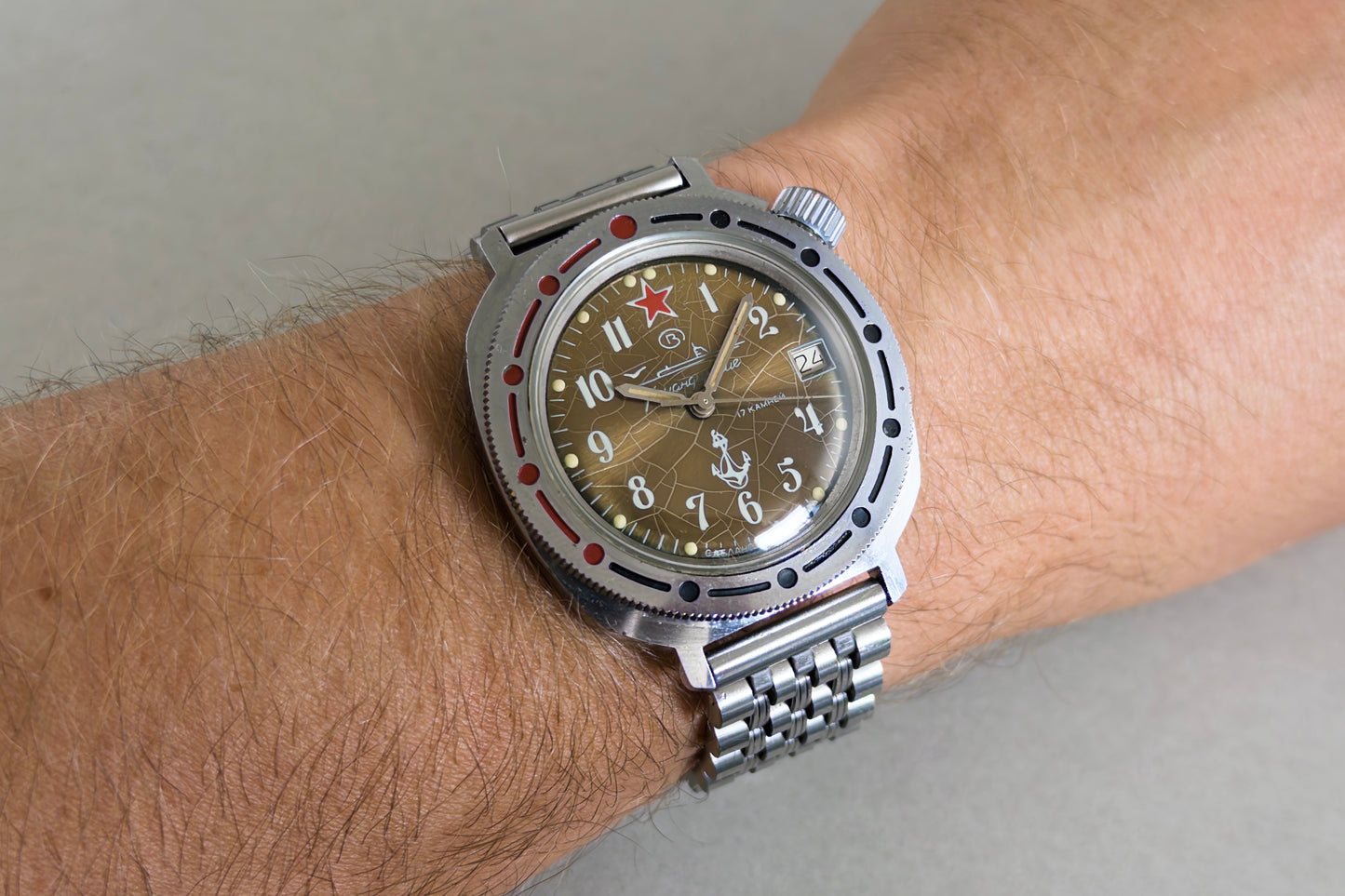 Vostok Komandirskie Tropical Spider worn on the wrist on its steel bracelet