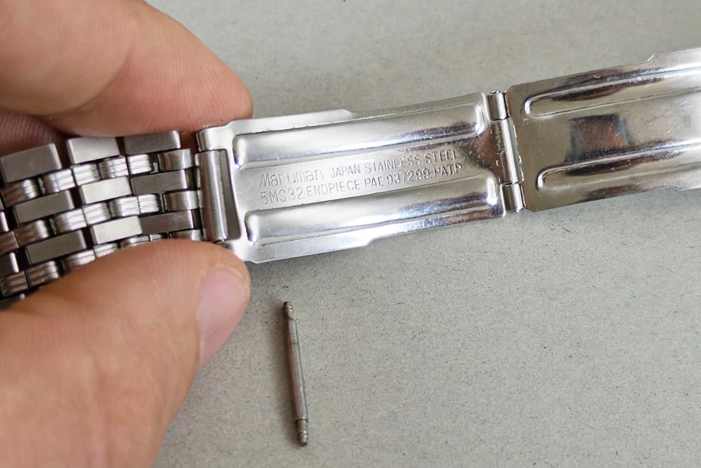 Steel bracelet and clasp of the Vostok Komandirskie shown with a spring bar