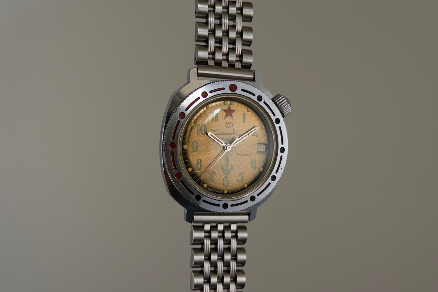 Aged tropical brown dial of the Vostok Komandirskie with its spider-web crazing