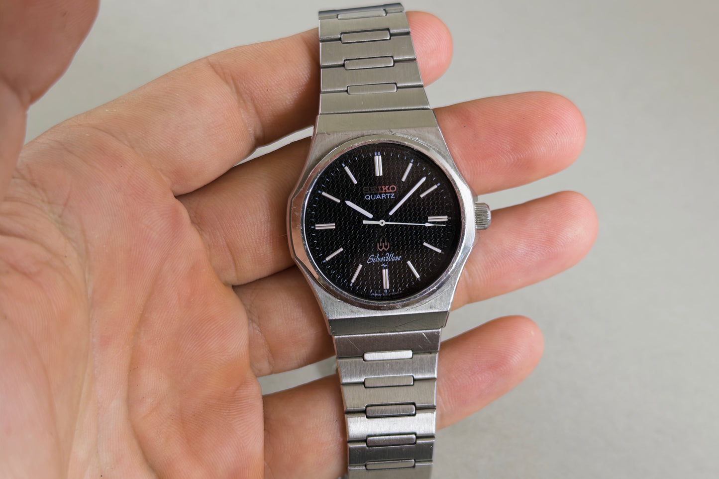Seiko Silverwave 7121-703B held in hand, showing the case and bracelet proportions
