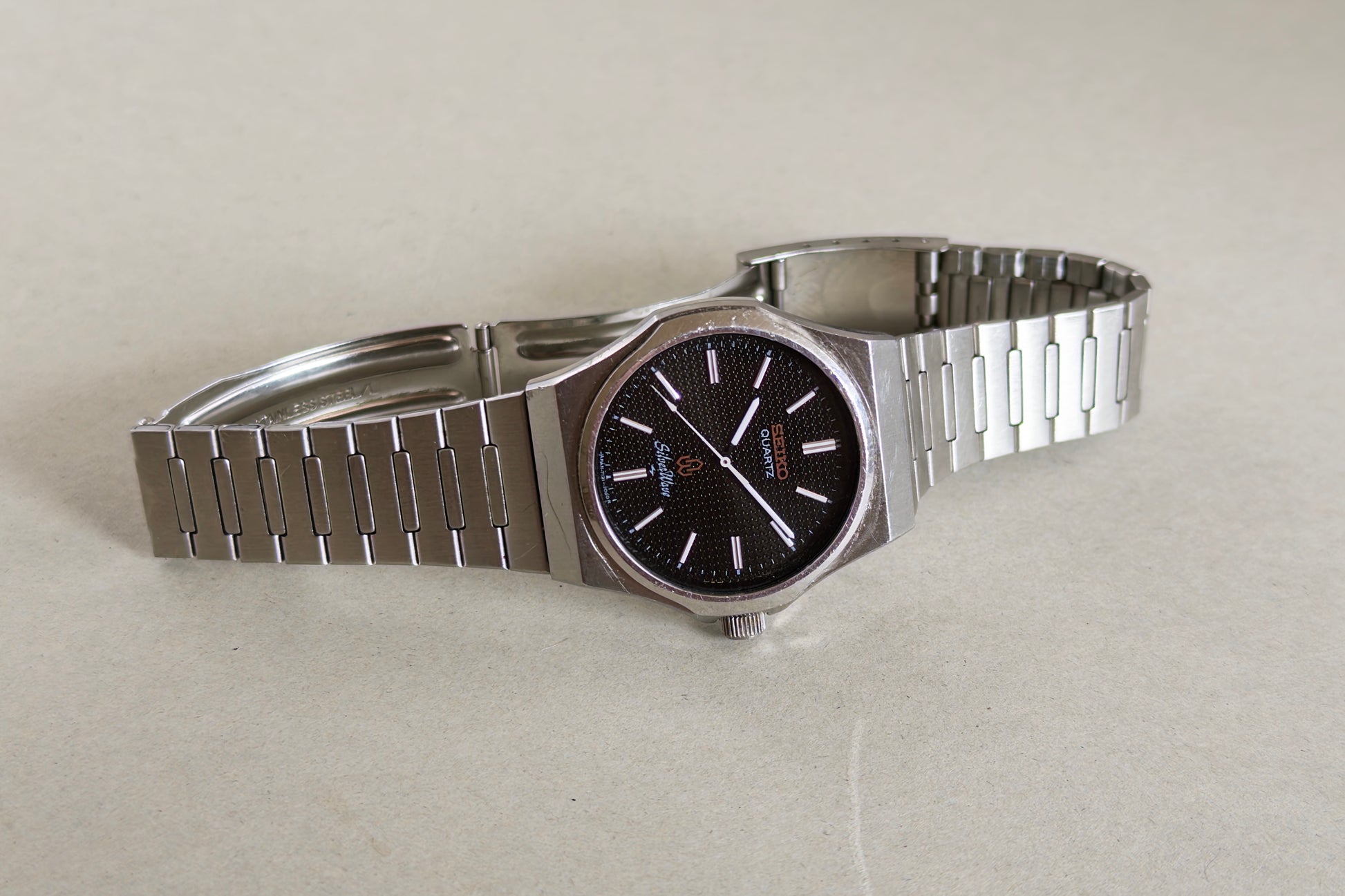 Seiko Silverwave 7121-703B laid flat showing its integrated steel bracelet
