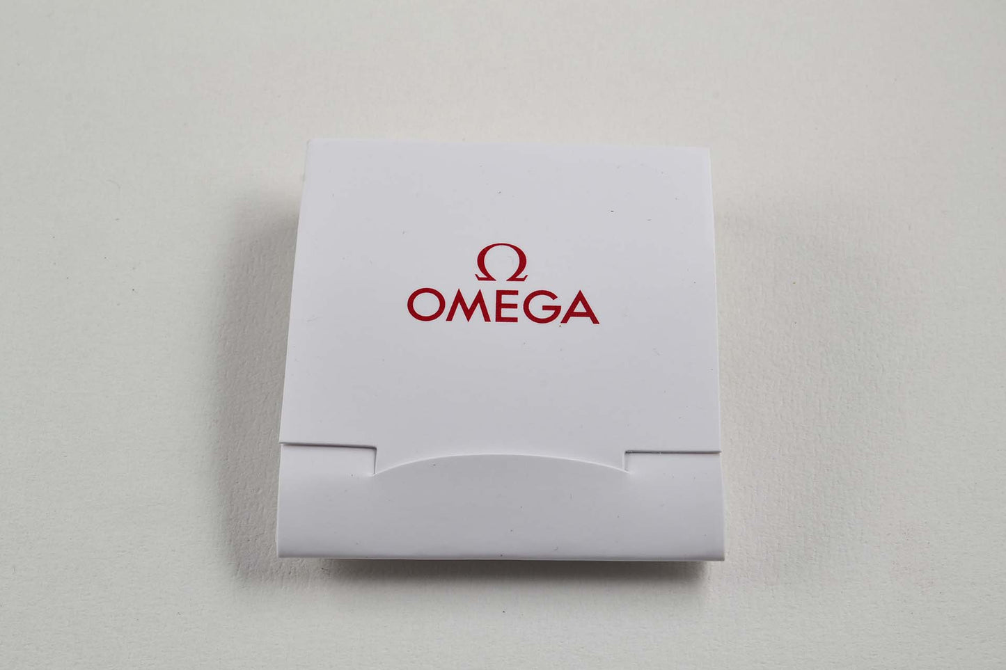 Omega Golf Tees chevilles lumeville horloger montre